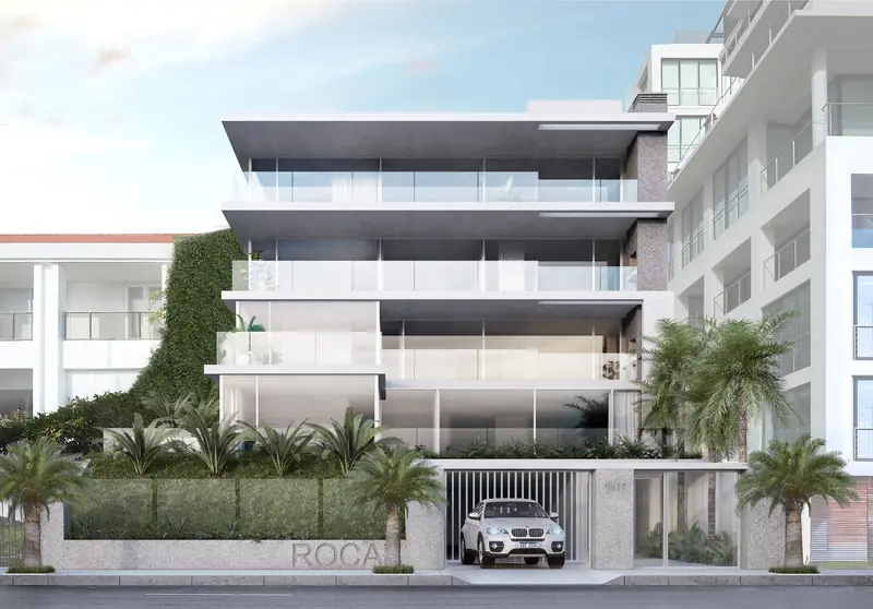 Render de la fachada frontal de Rocat: cuatro plantas de terrazas acristaladas sobre el muro de acceso con jardín